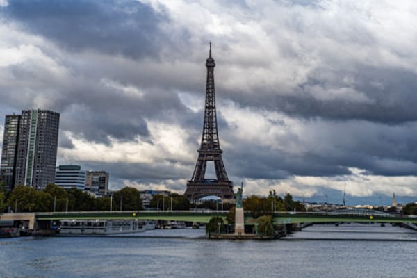 The Louvre Museum in Paris with iconic pyramid and historical architecture